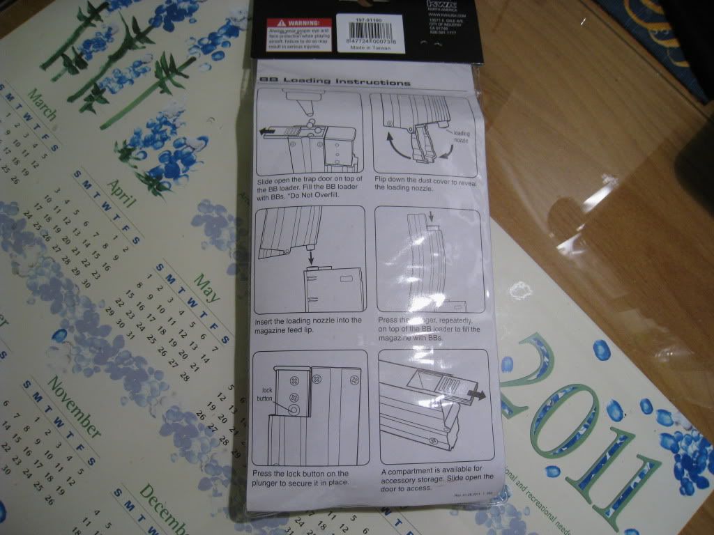 http://i8.photobucket.com/albums/a1/aznriptide859/Airsoft/KWA Magazine Speed Loader/IMG_1374.jpg